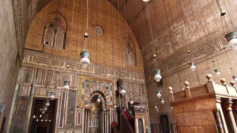 The grand Mosque of Sultan Hassan in Cairo, known for its majestic architecture and historic significance.