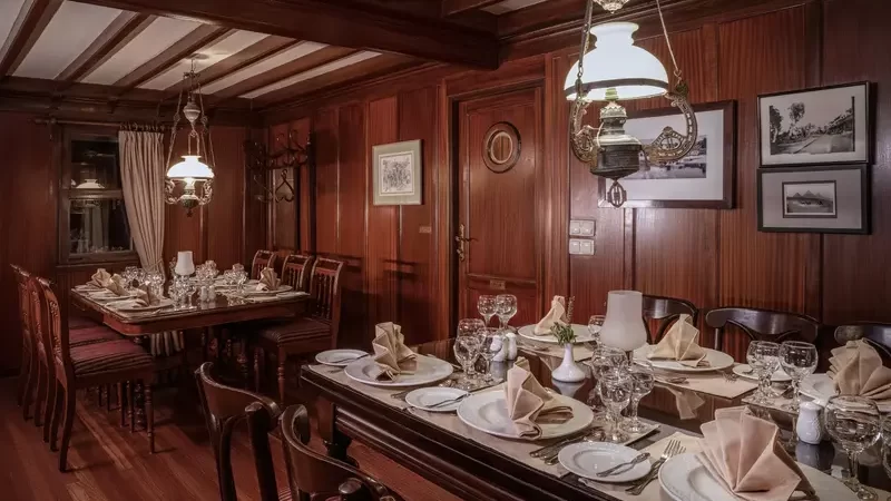 Elegant dining room aboard Farouz El Nil I Dahabiya – Luxury Nile cruise experience