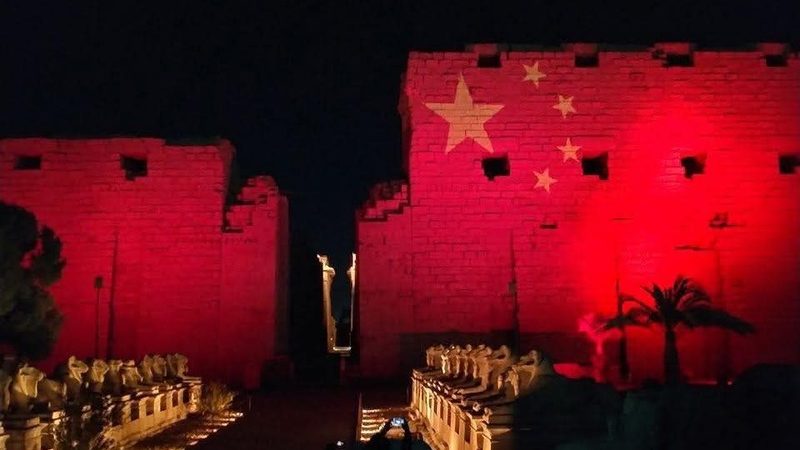 Night view of the Sound & Light Show at Karnak Temple, illuminating ancient columns with colorful lights and storytelling.
