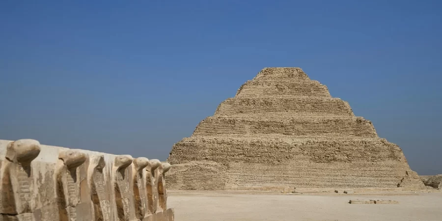Djoser’s Step Pyramid rising from the Saqqara sands, a must-see stop on Cairo day tours