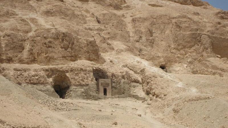 Entrance to the Valley of the Kings carved into the desert hills, a highlight on any tour to Valley of the Kings